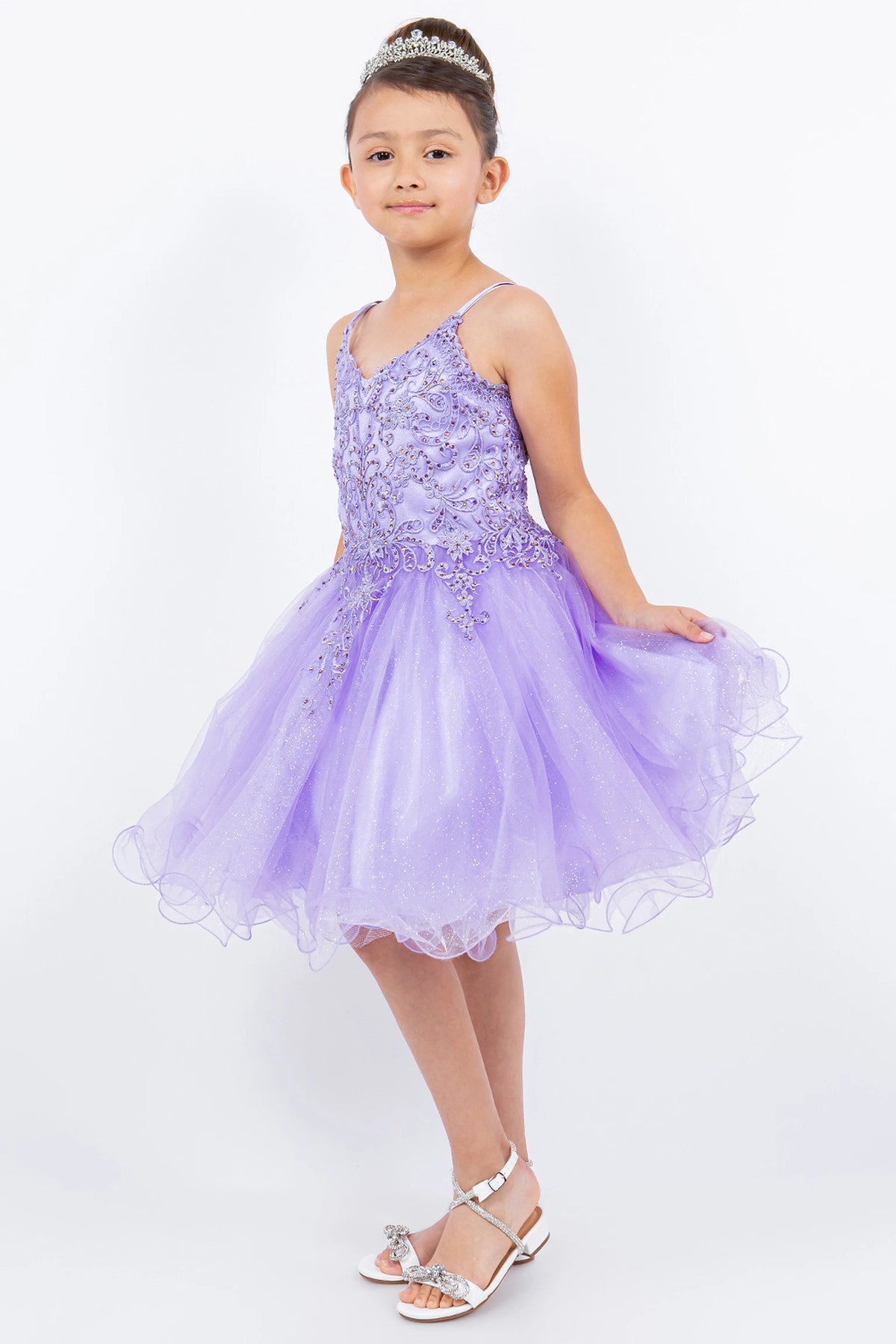 Accented a soft tulle skirt adds character to this Lavendar kids party dress.