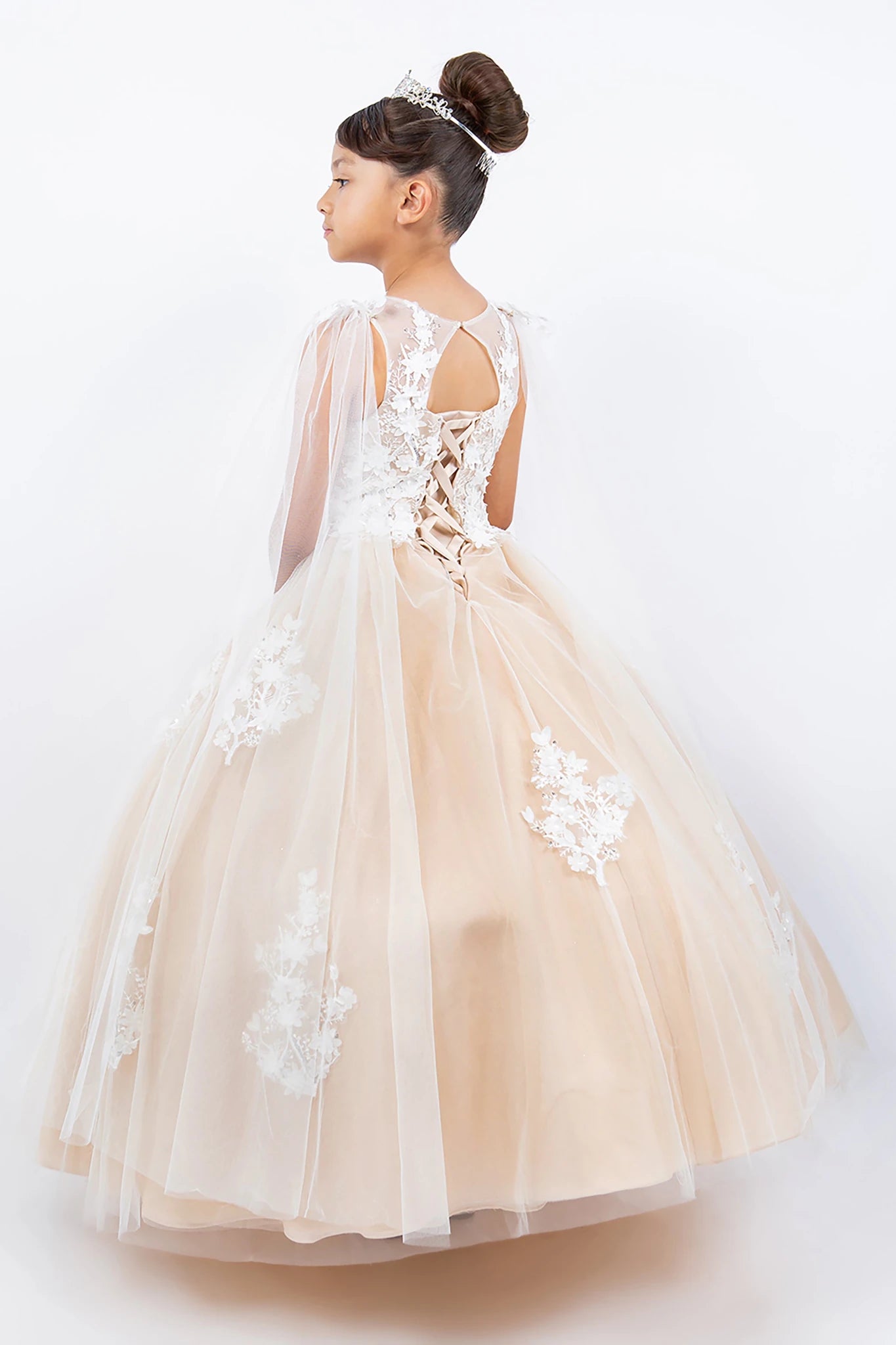 A champagne and white floral flower girl dress. Also suitable as a mini quince dress.