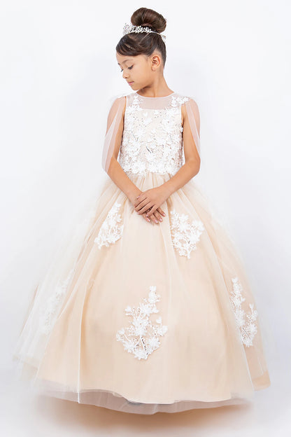 Young girl wearing a champagne and white floral dress on a white background