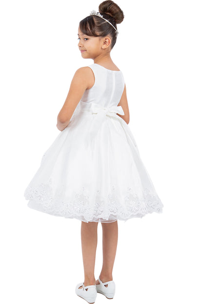 A Off-White flower girl dress showing satin bow above the lace-trimmed back skirt.