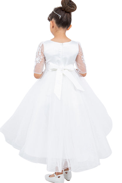 A Off-White flower girl dress showing large back bow above the layered skirt.