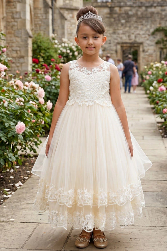 Champagne flower girl dress features lace bodice and layered tulle skirt.