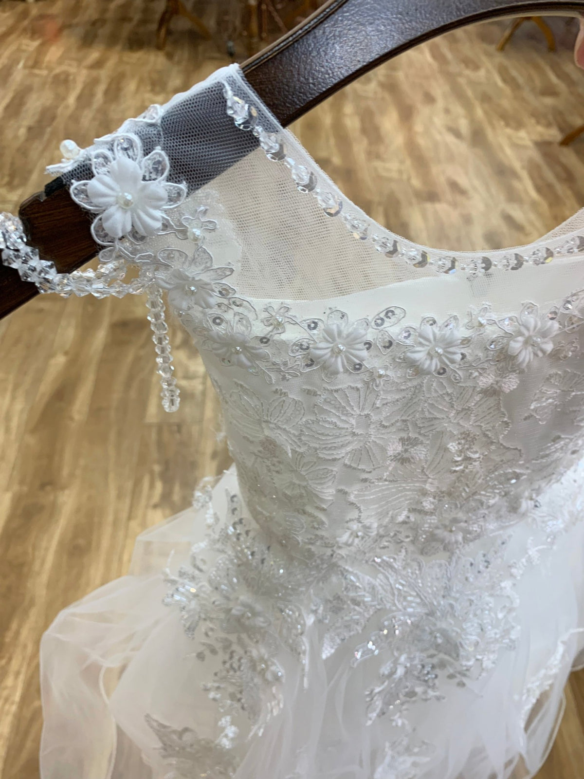 Front view of Off-White Illusion Lace Top with Shoulder Beads and Crystalize Tulle flower girl dress.