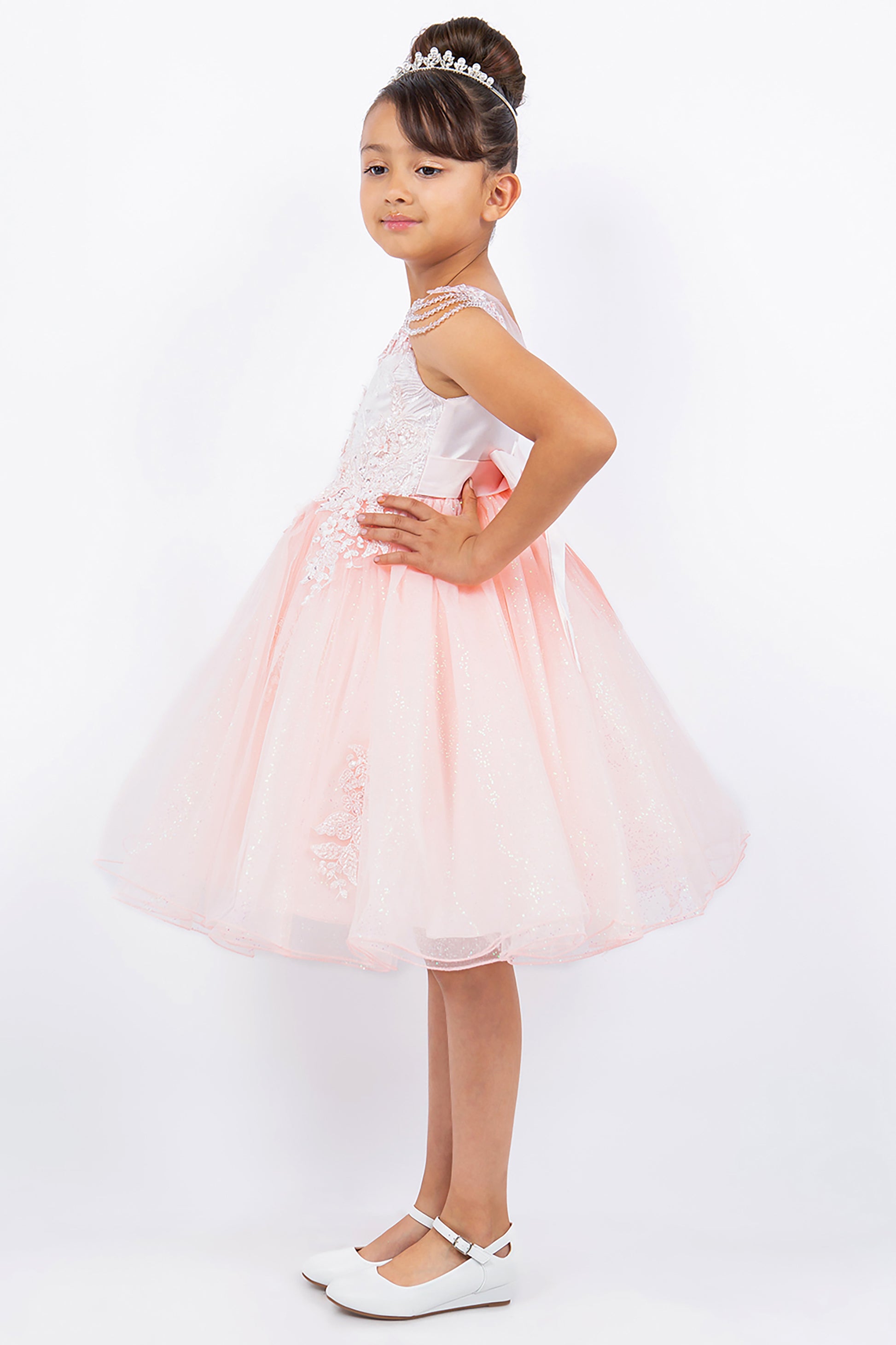 Blush Illusion Lace Top with Shoulder Beads and Crystalize Tulle Flower Girl Dress - side view of girl wearing dress with hand on hip