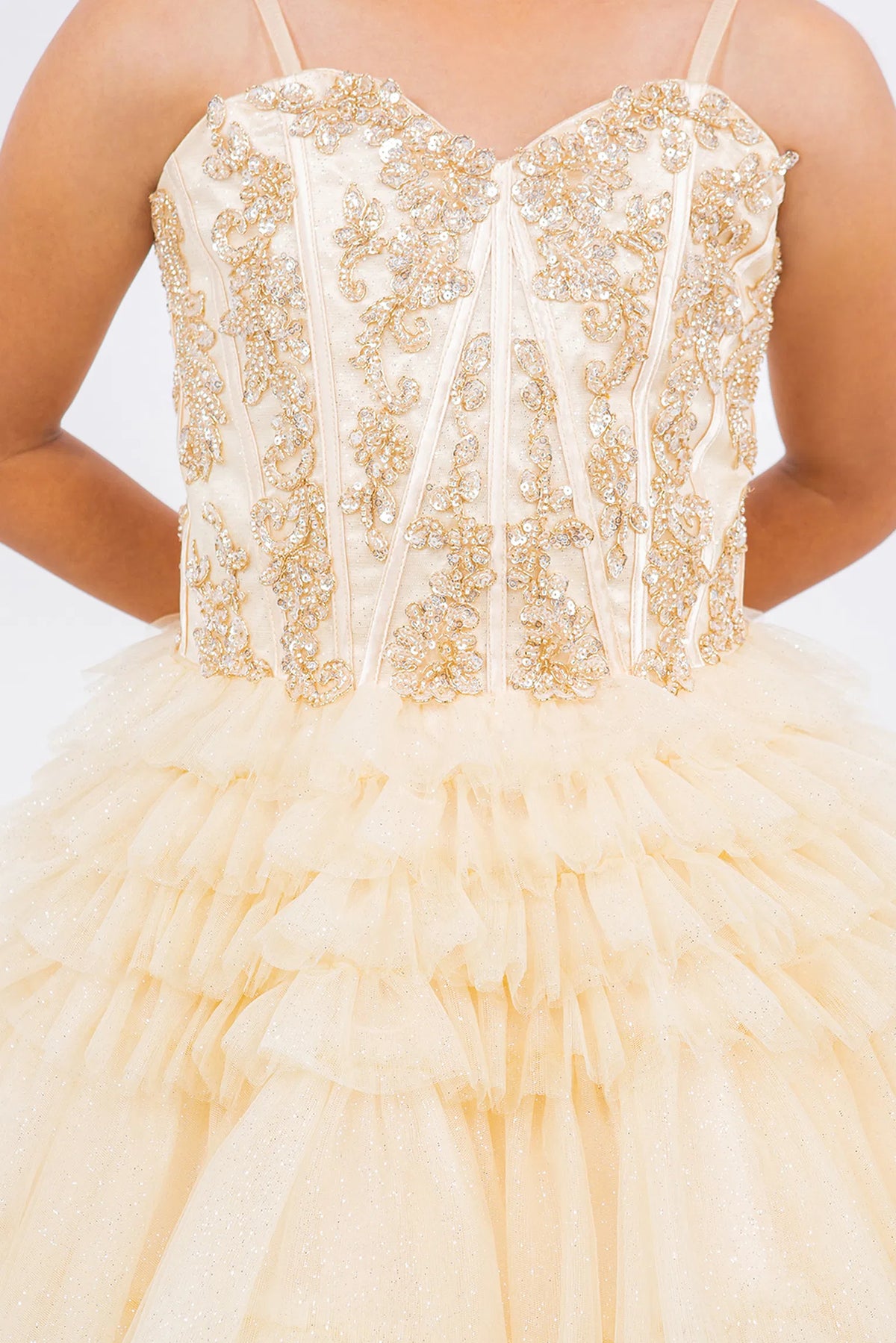 Featuring with tiered tulle ruffles, this Champagne kids party dress displays elegant detail.