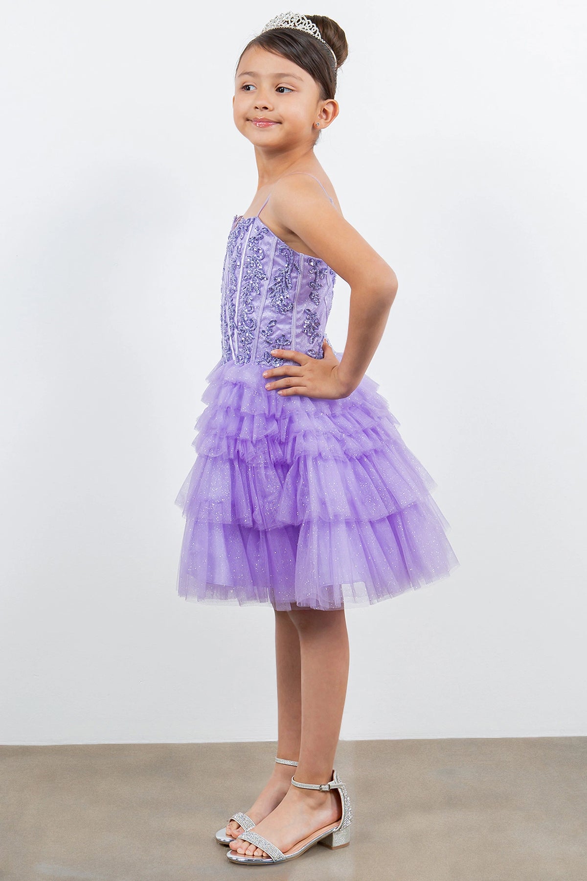 Featuring with floral bodice embellishments, this Lilac kids party dress displays elegant detail.