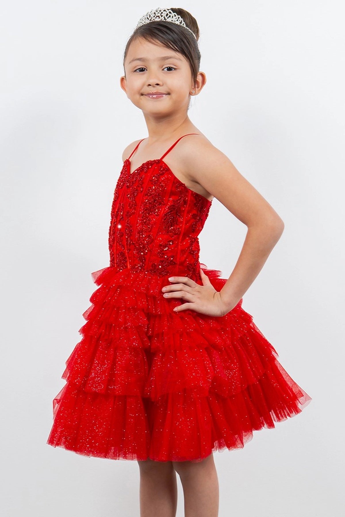 Designed details of tiered tulle ruffles distinguish the Red kids party dress.
