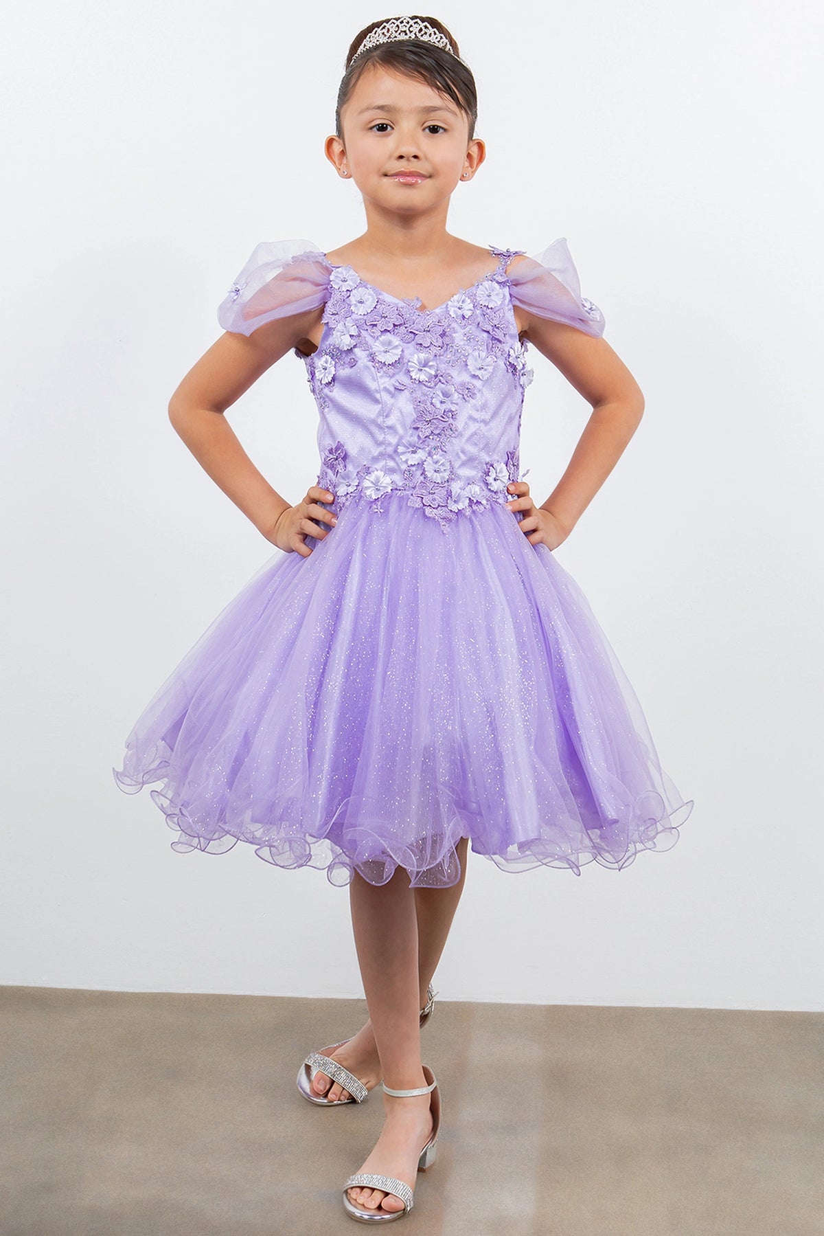 Accented dimensional flowers at the shoulders adds character to this Lavendar kids party dress.