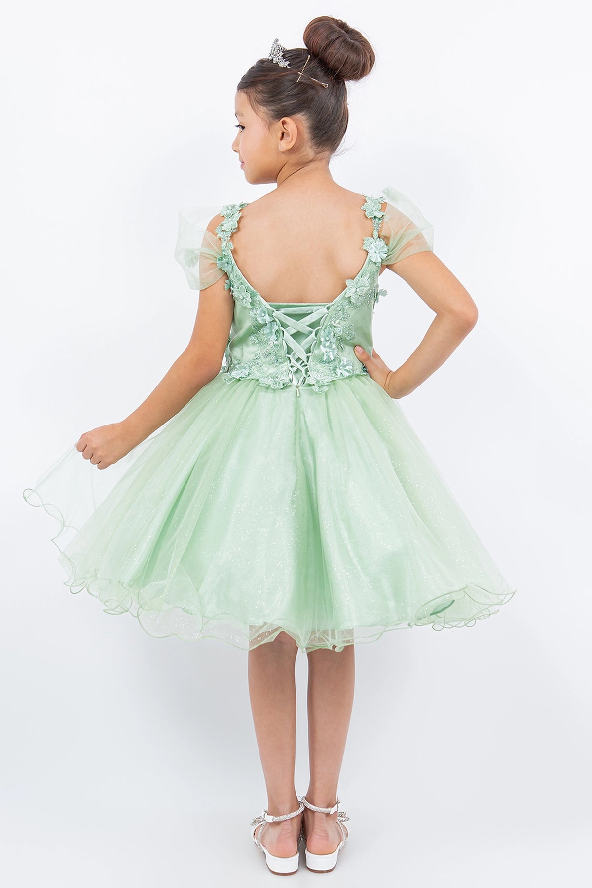 Finished details of floral lace and back lacing distinguish the Sage kids party dress.