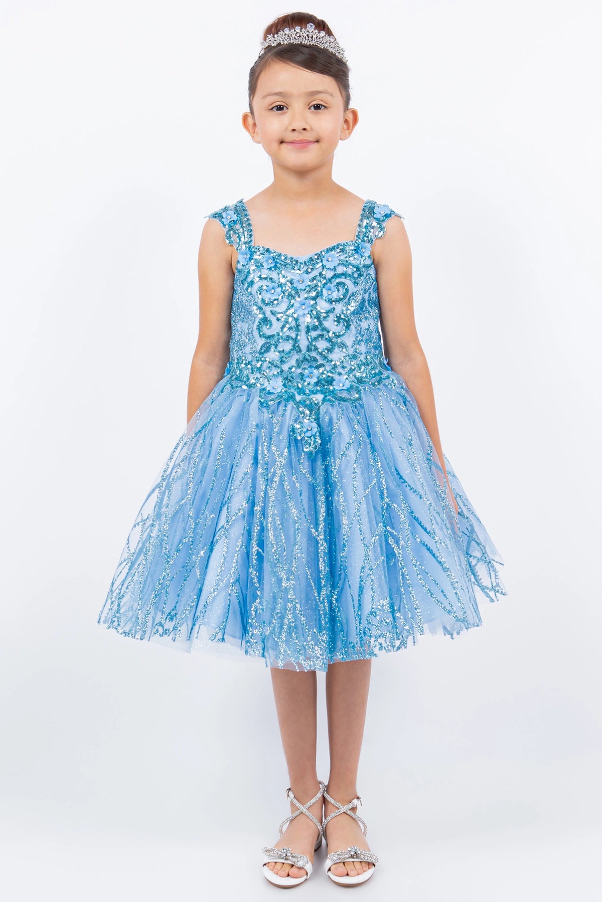 Showcasing with ornate lace across the bodice, this Blue kids party dress displays elegant detail.