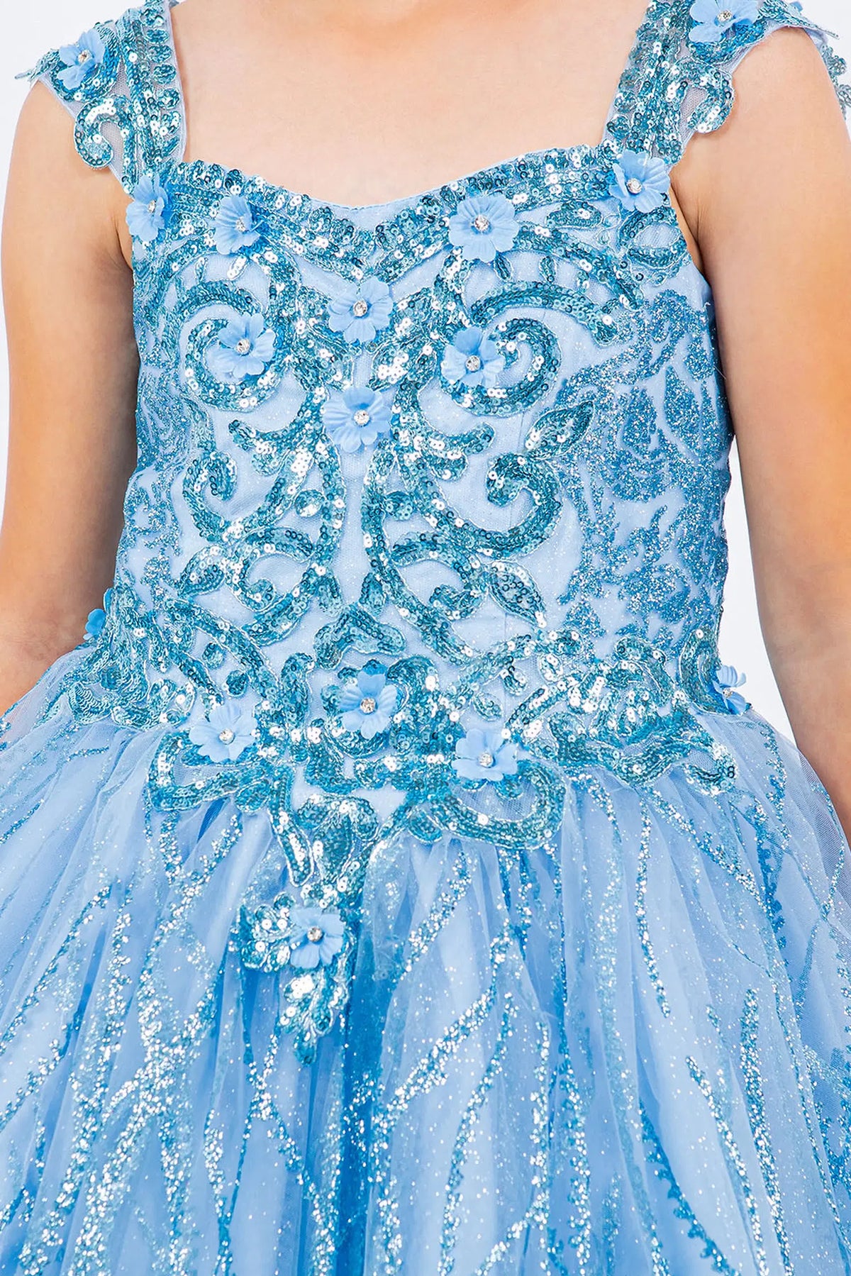 Designed details of ornate lace across the bodice distinguish the Blue kids party dress.