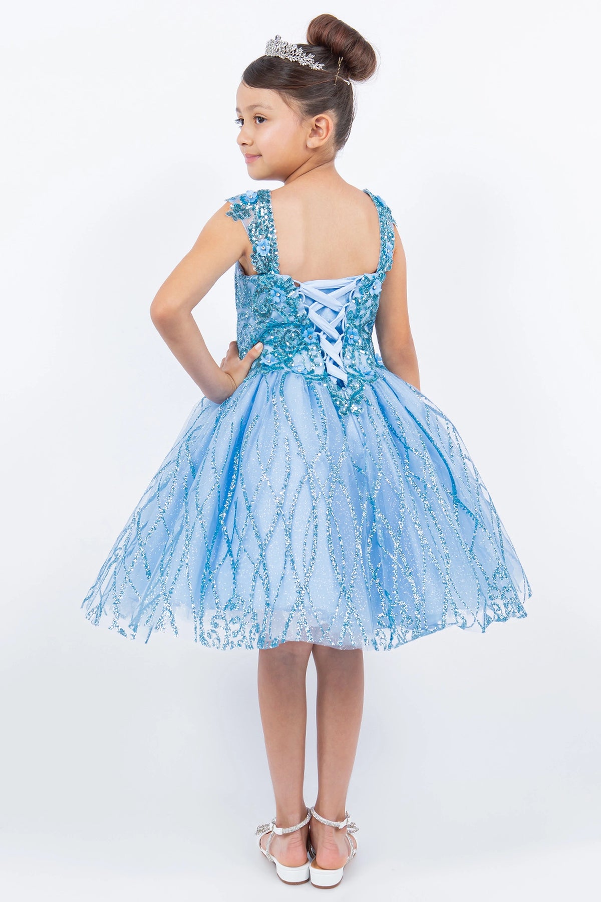 Finished details of crisscross back lacing distinguish the Blue kids party dress.