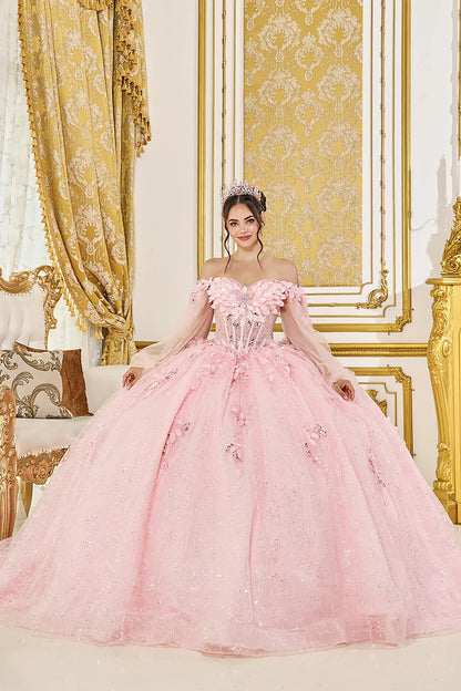Woman in Blush off-shoulder quinceañera ball gown with 3D floral corset and glitter tulle skirt.