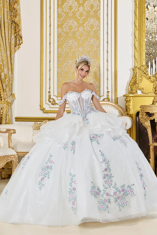 Woman in Off white off-shoulder quinceañera ball gown with floral corset and glitter tulle skirt.
