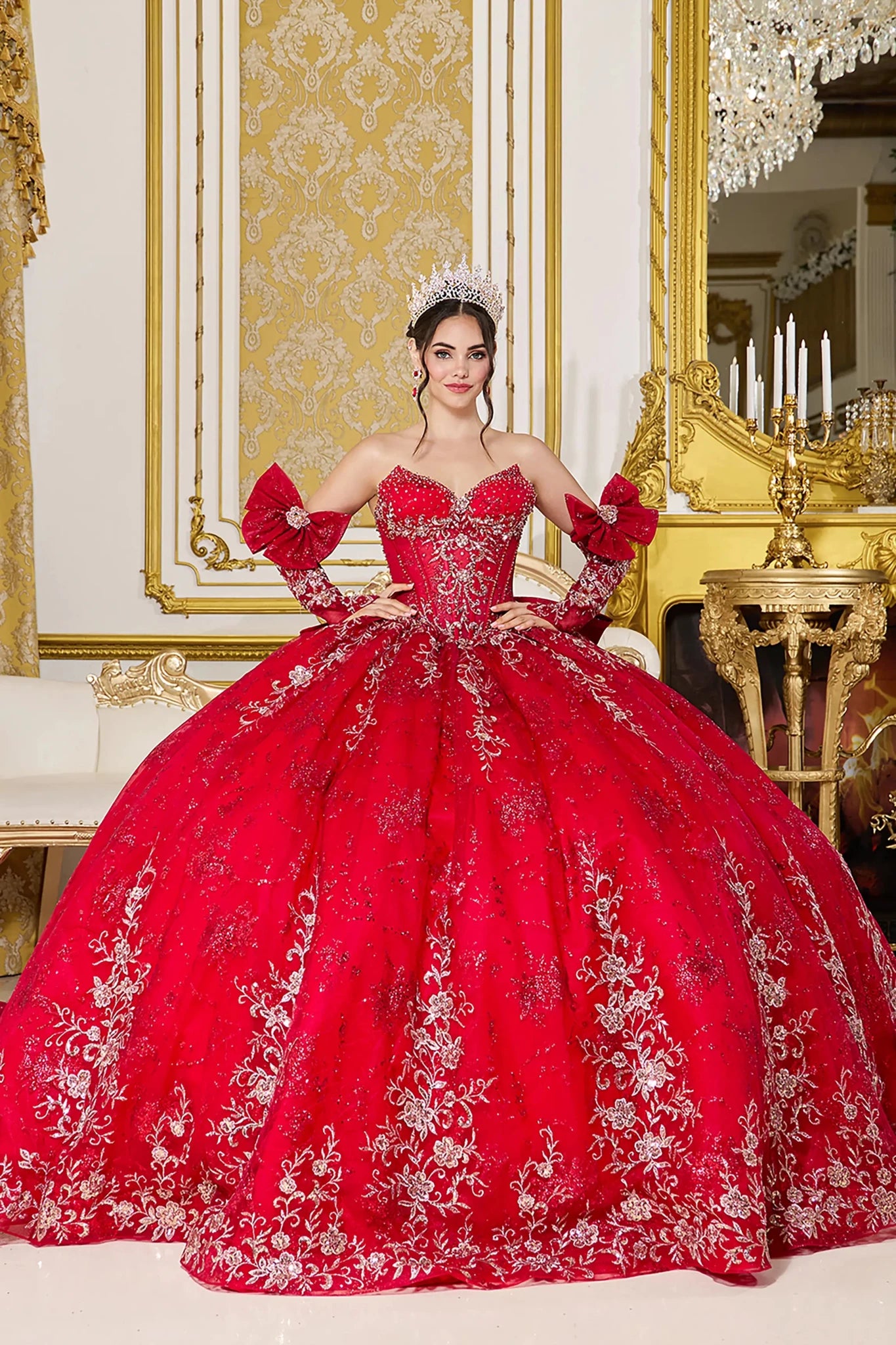 Woman in Red strapless quinceañera ball gown with embellished corset and bow sleeves.