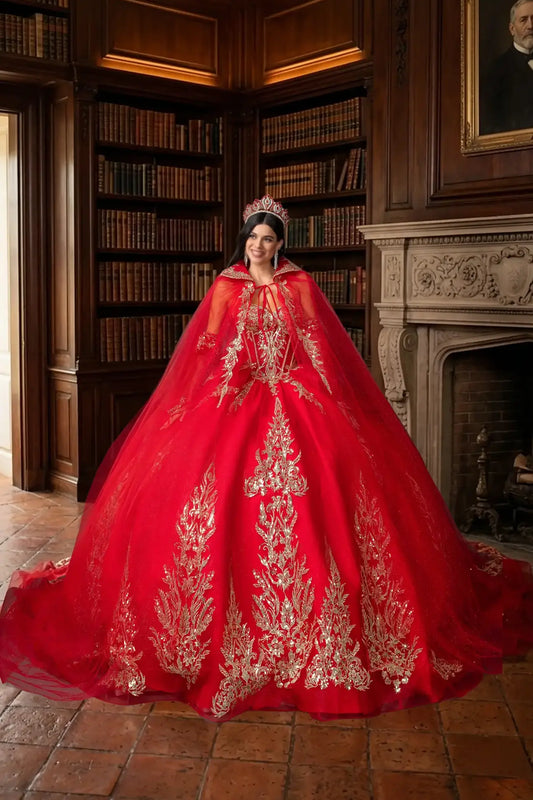 Woman wearing red off-shoulder ball gown quinceañera dress with embroidered corset bodice,  detachable hooded cape