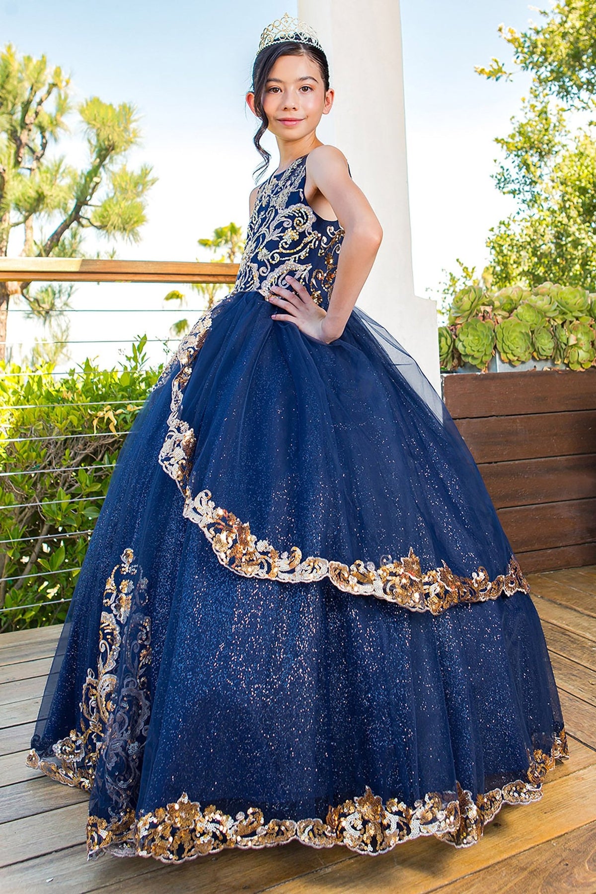 Navy mini quince dress with glittered two-tone lace satin tulle side view.