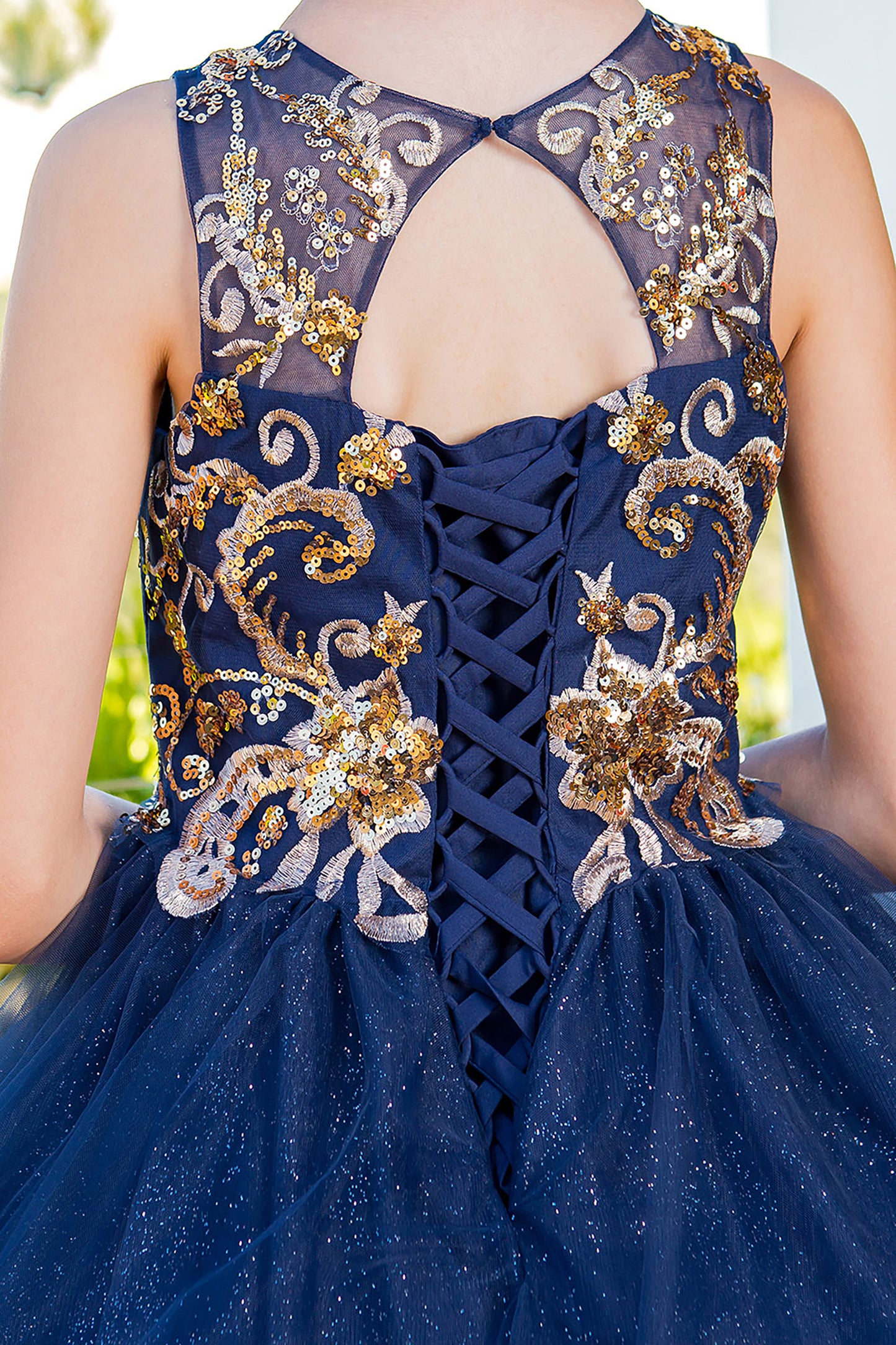 Elegant Glittered Two-tone Golden lace Satin Tulle with Patch Lace Wired Skirt Mini Quince Dress - zoomed in back view of dress showcasing beautiful pattern and details