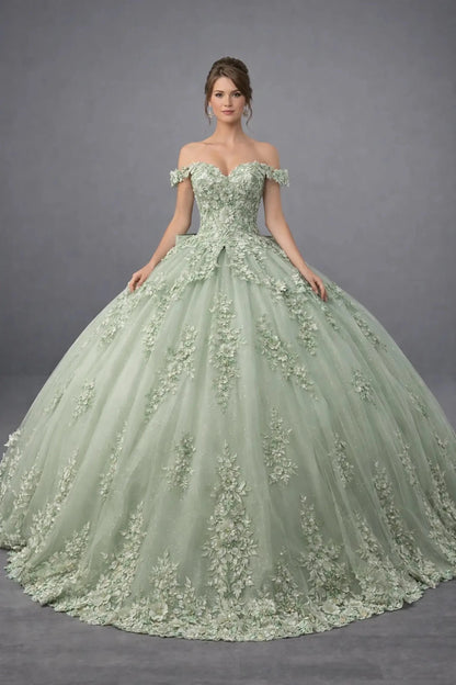 Woman standing front-facing in elegant sage ball gown with 3D floral appliqué bodice, ruffle sleeves, and voluminous layered skirt