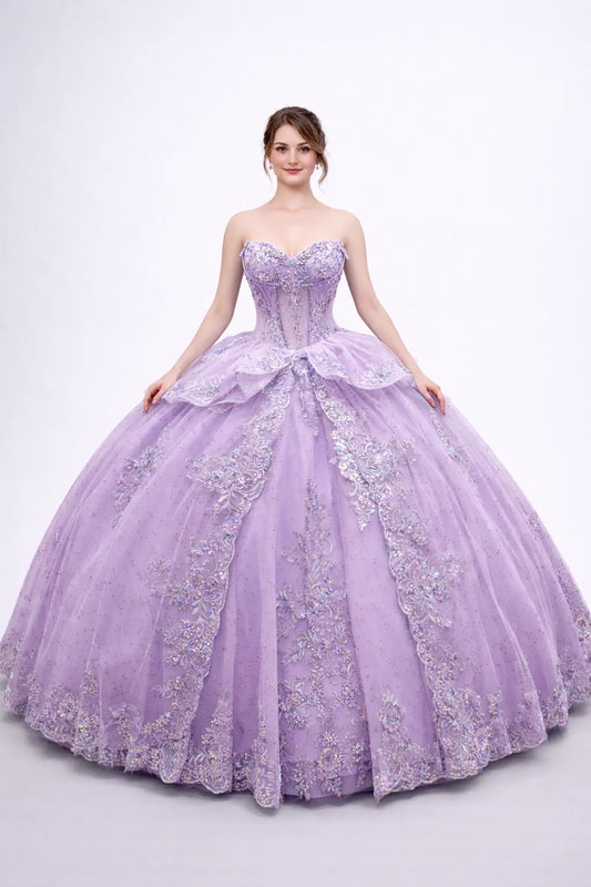 Front view of a woman wearing lilac quinceañera dress, strapless corset, embroidered appliques, layered tulle overskirt