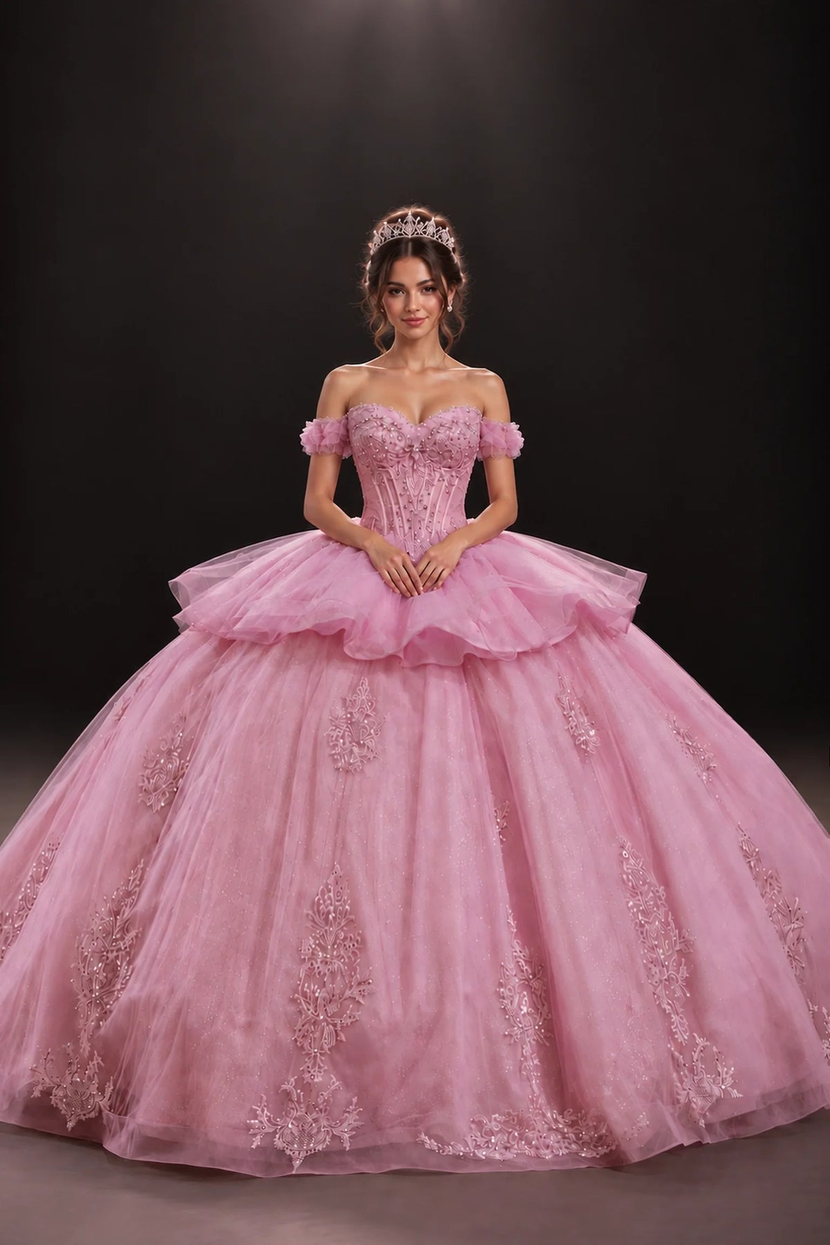 Pink embroidered quinceanera dress with draped skirt and beaded bodice, full front view