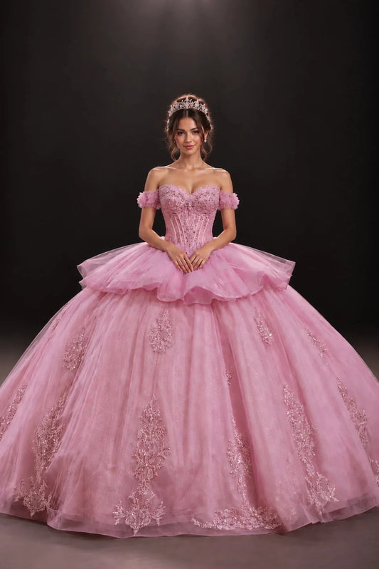 Pink embroidered quinceanera dress with draped skirt and beaded bodice, full front view