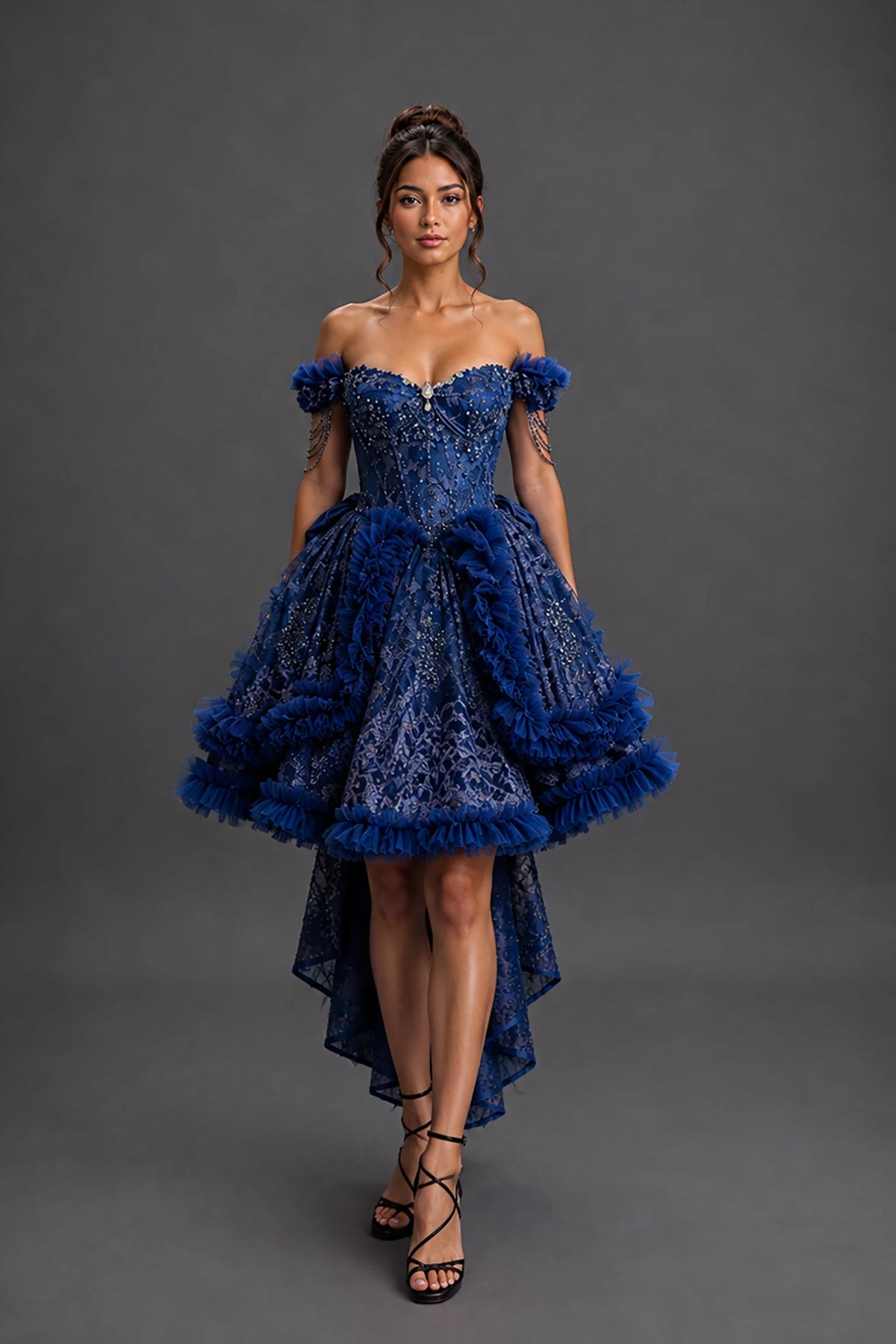 Front view of navy quinceañera dress showing glitter lace bodice without the detachable overskirt