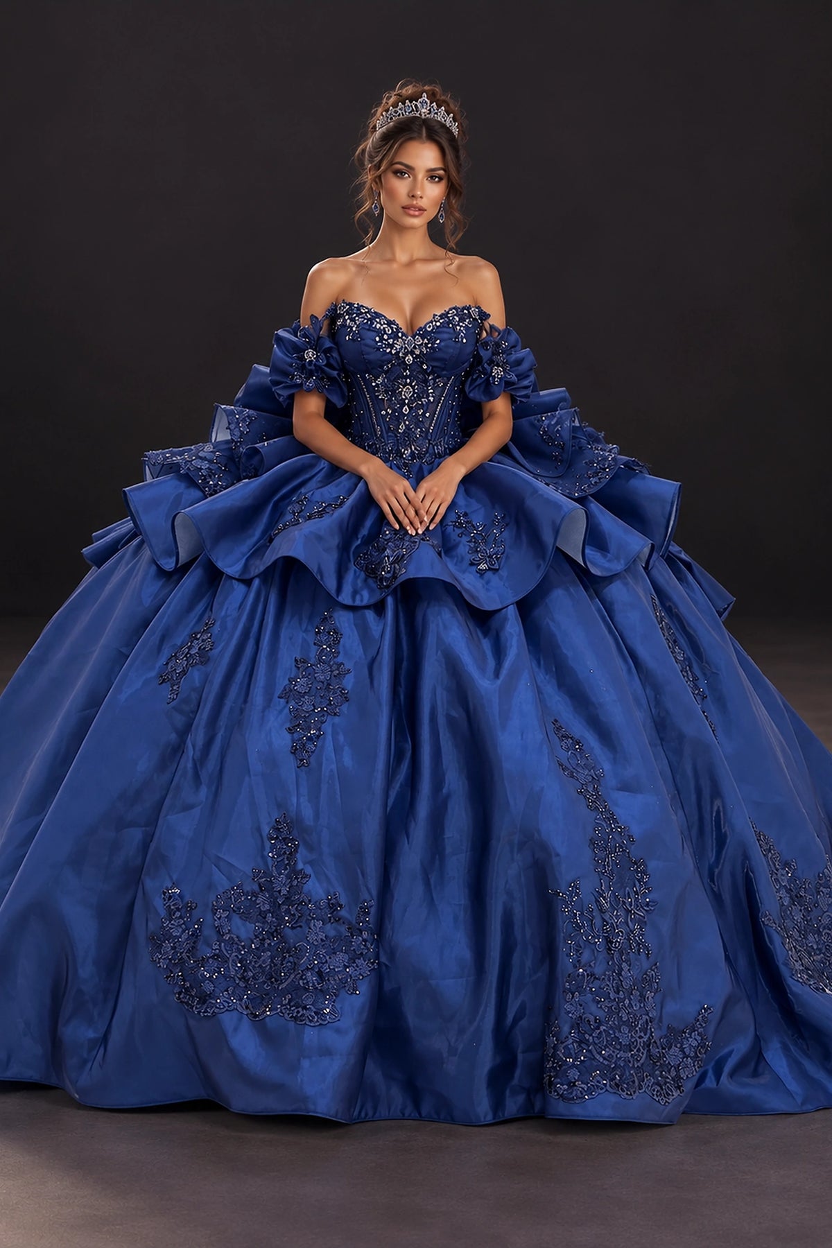 Featuring a floor-length skirt, this Navy quinceañera ball gown is shown in full view.