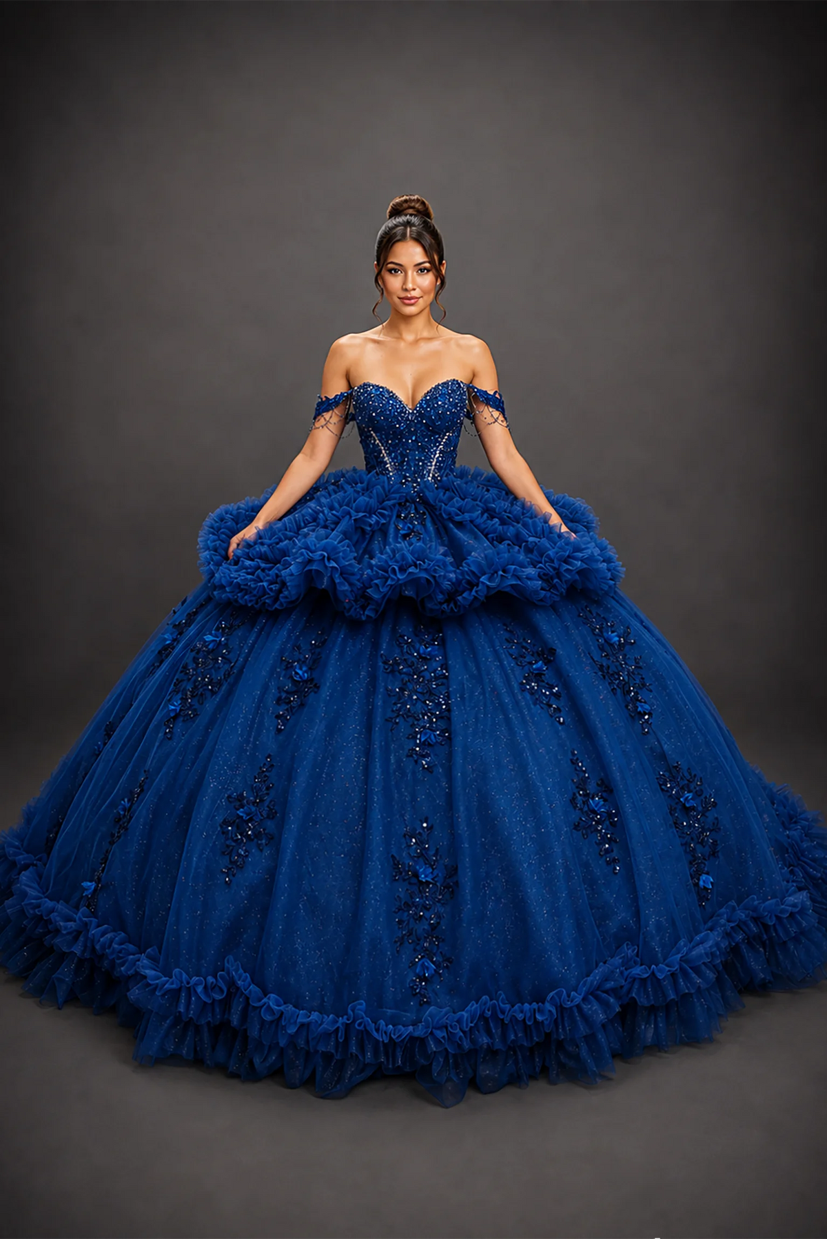 Front view of navy quinceañera dress with glitter lace, beaded bodice and tiered ruffle skirt