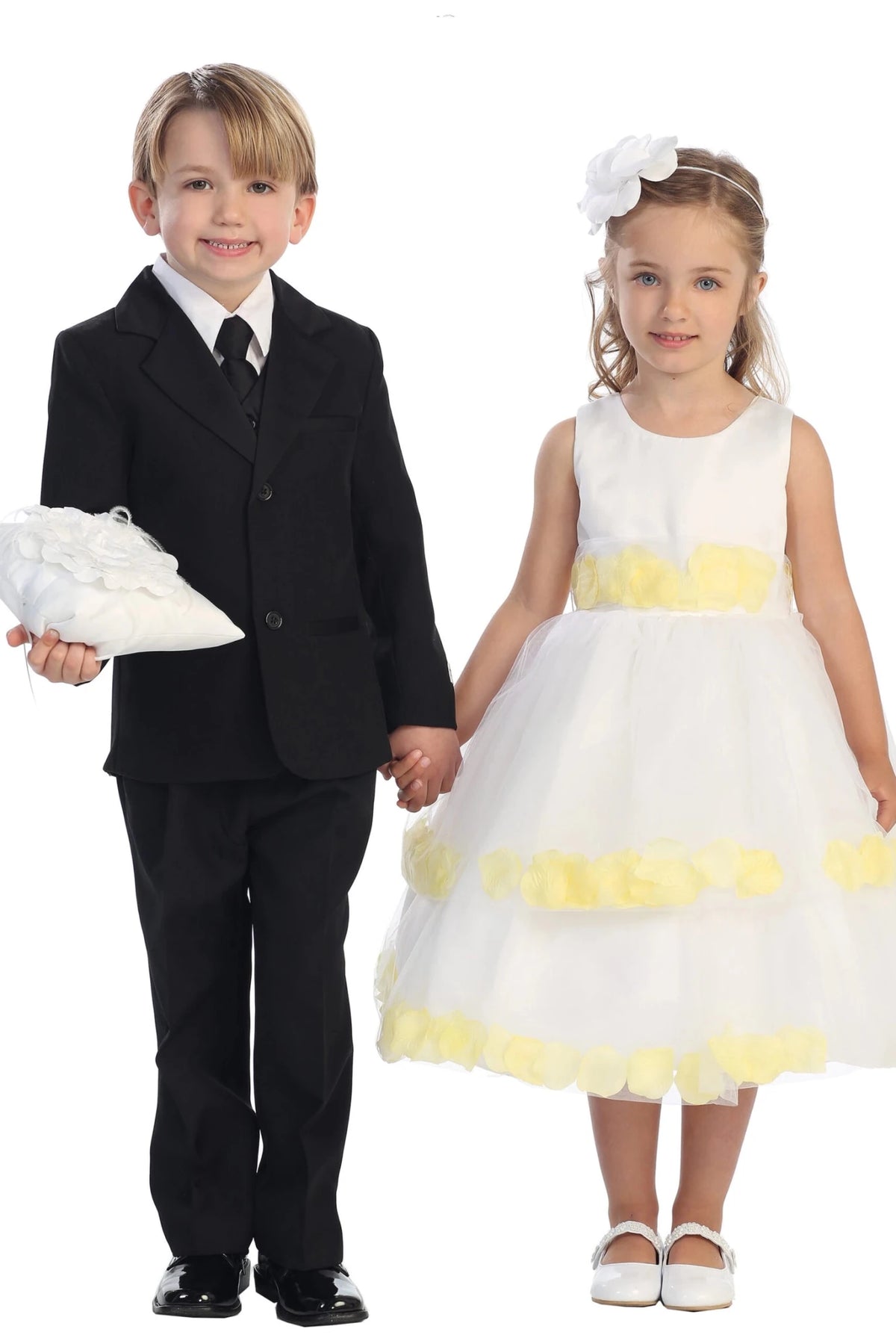 Lemon-yellow petals circle the off-white flower girl dress's waist.