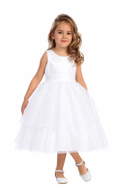 A view of a broad pleated waist on the white flower girl dress.