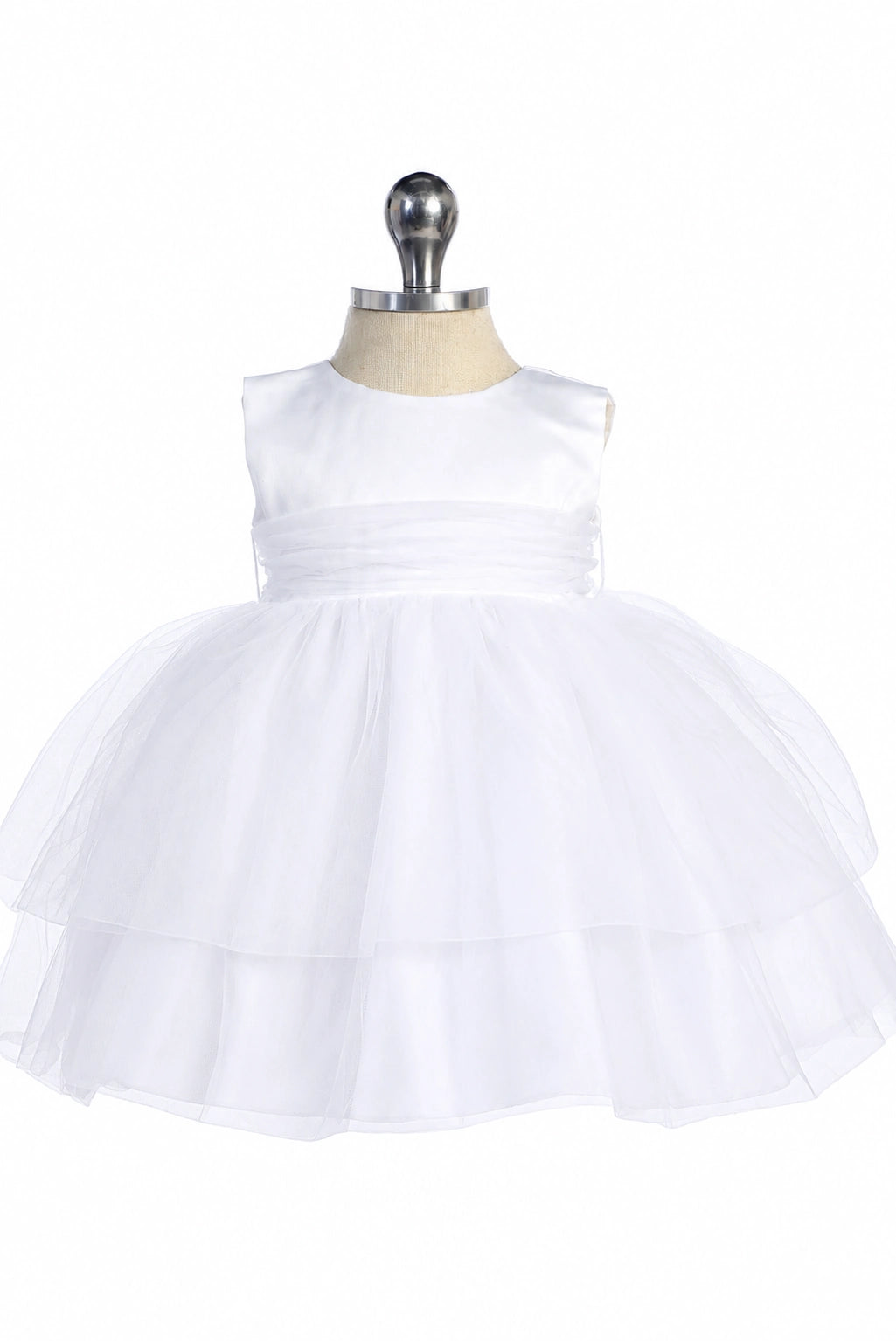 Visible on the white flower girl dress: a smooth satin bodice.