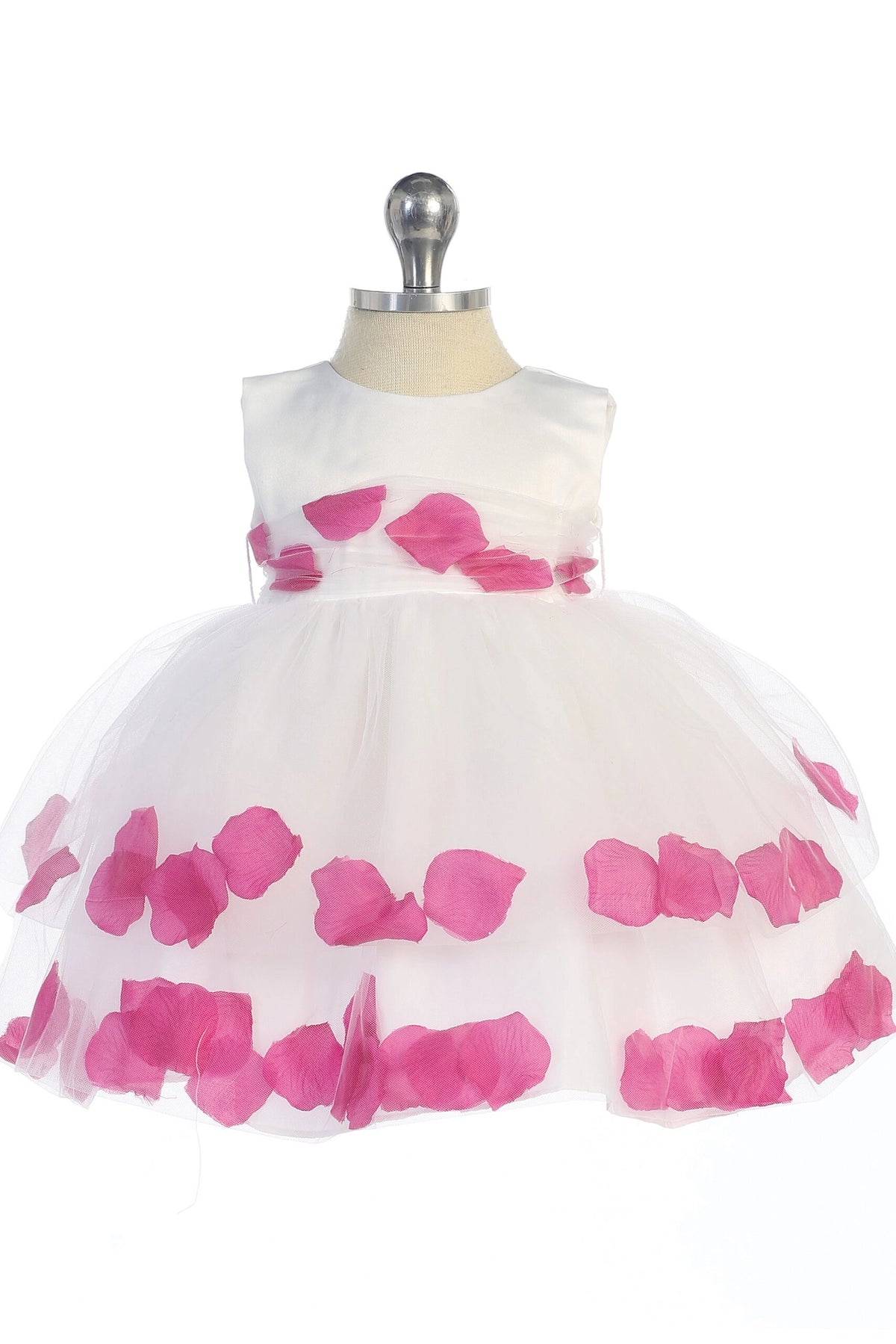 Fuchsia petal bands brighten a white flower girl dress.
