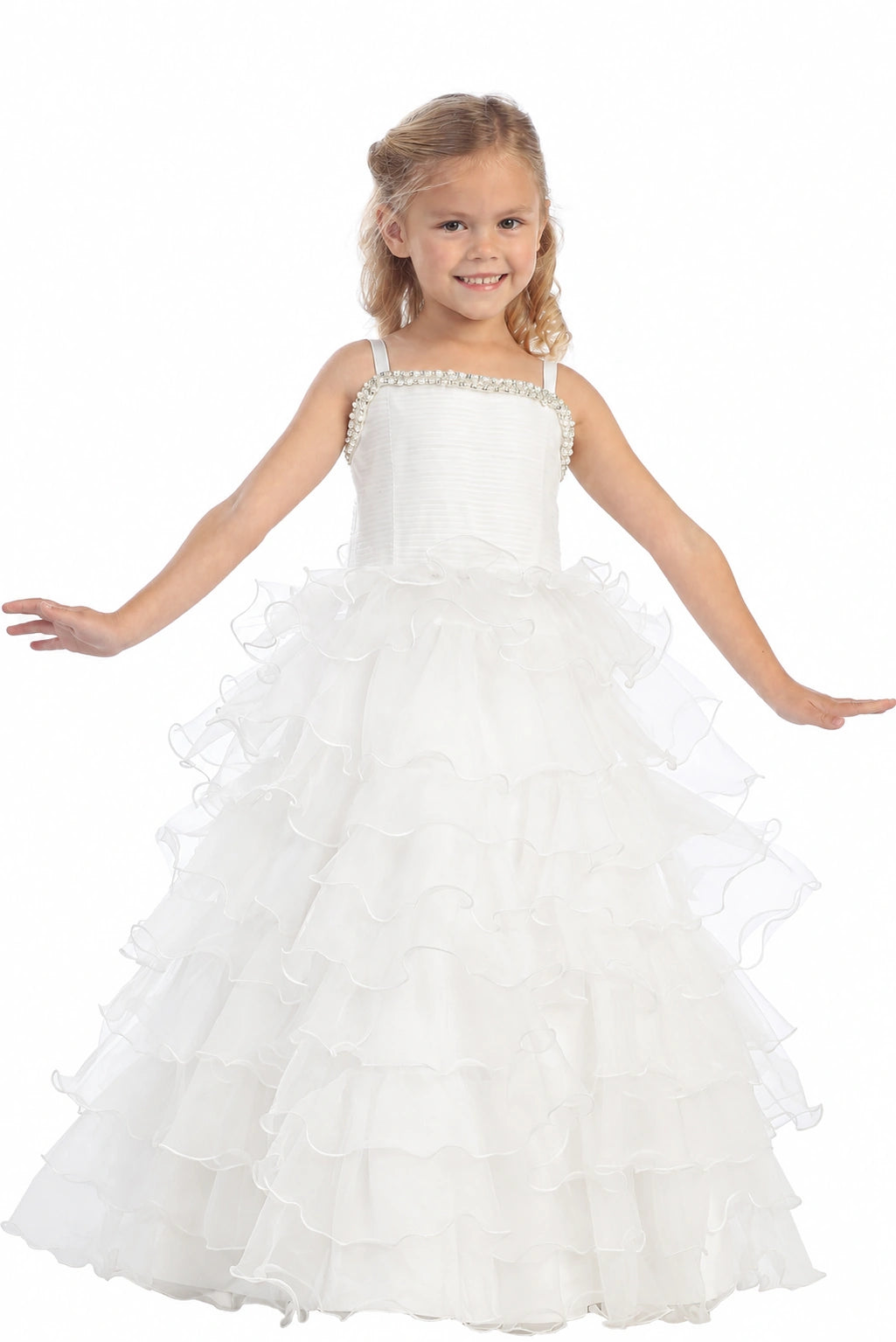 On this off-white flower girl dress, cascading skirt ruffles are visible.