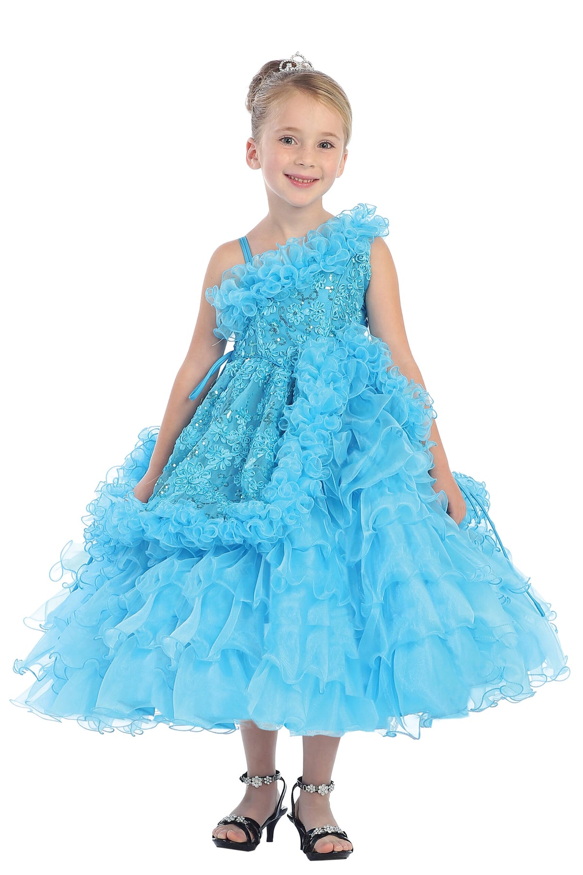 Turquoise kids pageant dress featuring an asymmetric ruffled neckline.