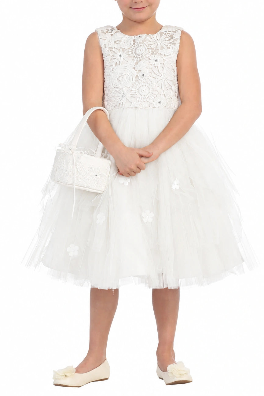 Highlighting layered floral mesh on an off-white flower girl dress.