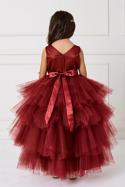 The Burgundy kids pageant dress has a tied sash across the back waist.