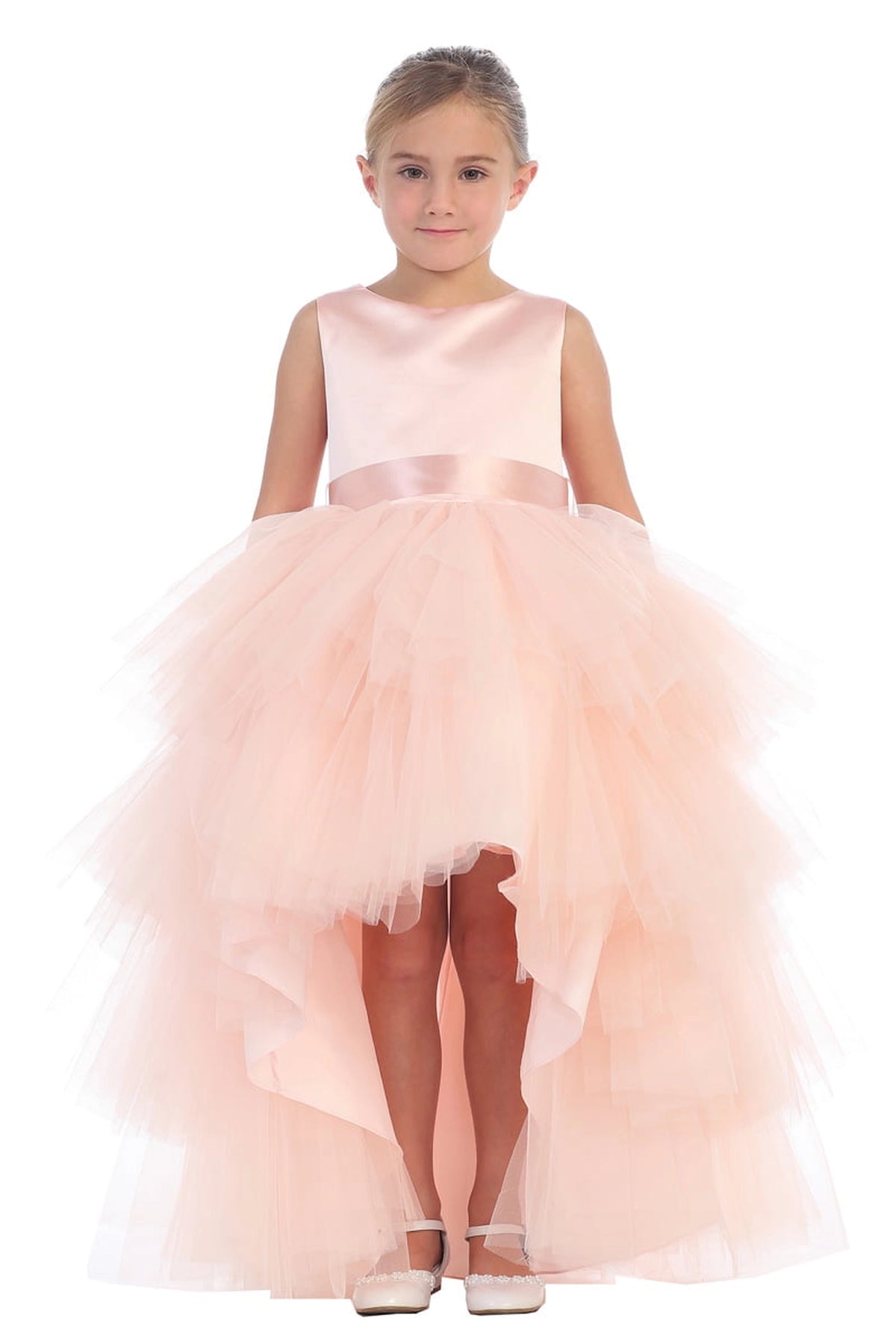 The Blush kids pageant dress has a satin bodice and layered high-low tulle.