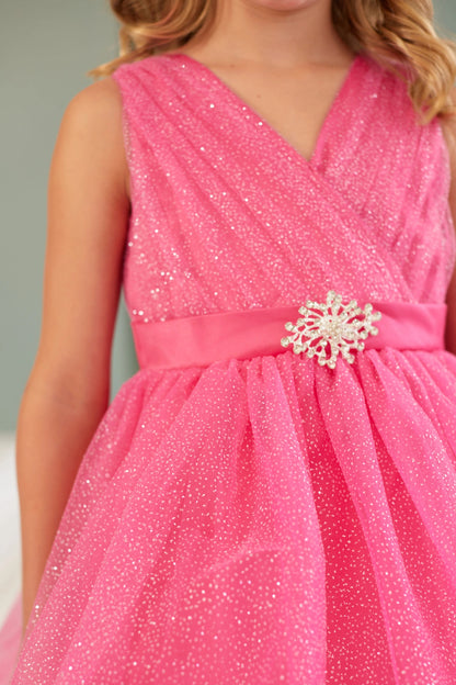 Fuchsia kids pageant dress featuring ruched tulle and a rhinestone waist brooch.
