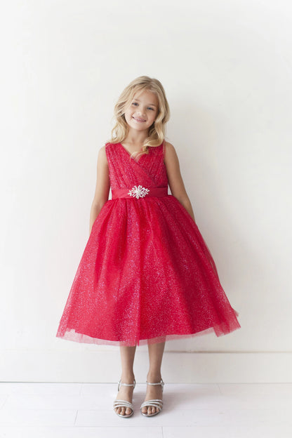 Red kids pageant dress featuring a ruched V-neckline and rhinestone brooch.