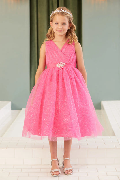 The Fuchsia kids pageant dress has a ruched V-neckline and rhinestone brooch.