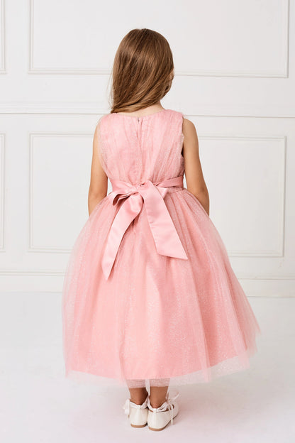 The Rose Gold kids pageant dress has a satin bow above the gathered skirt.