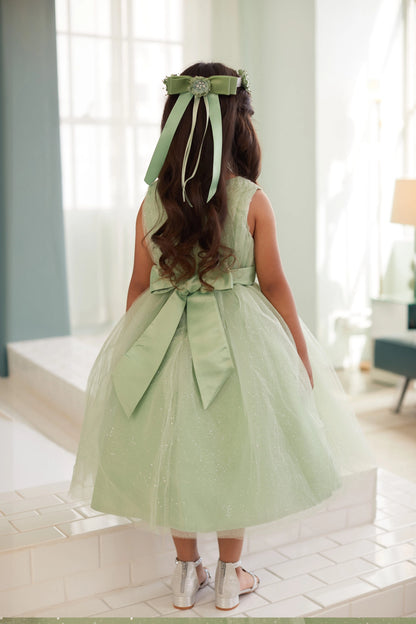Sage kids pageant dress featuring a satin bow above the gathered skirt.