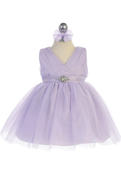 The Lilac kids pageant dress has a ruched V-neckline and rhinestone brooch.