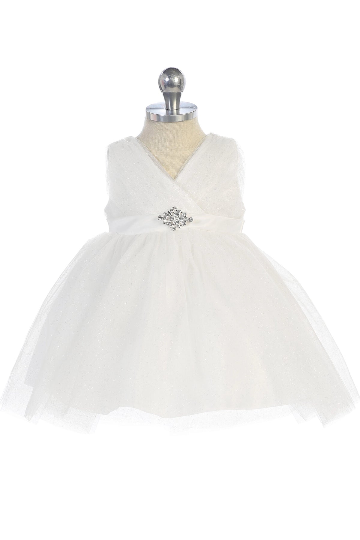 Visible details on the White kids pageant dress include a ruched V-neckline and rhinestone brooch.
