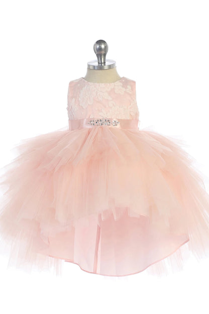 Defined by a sparkling waist brooch, this blush flower girl dress.