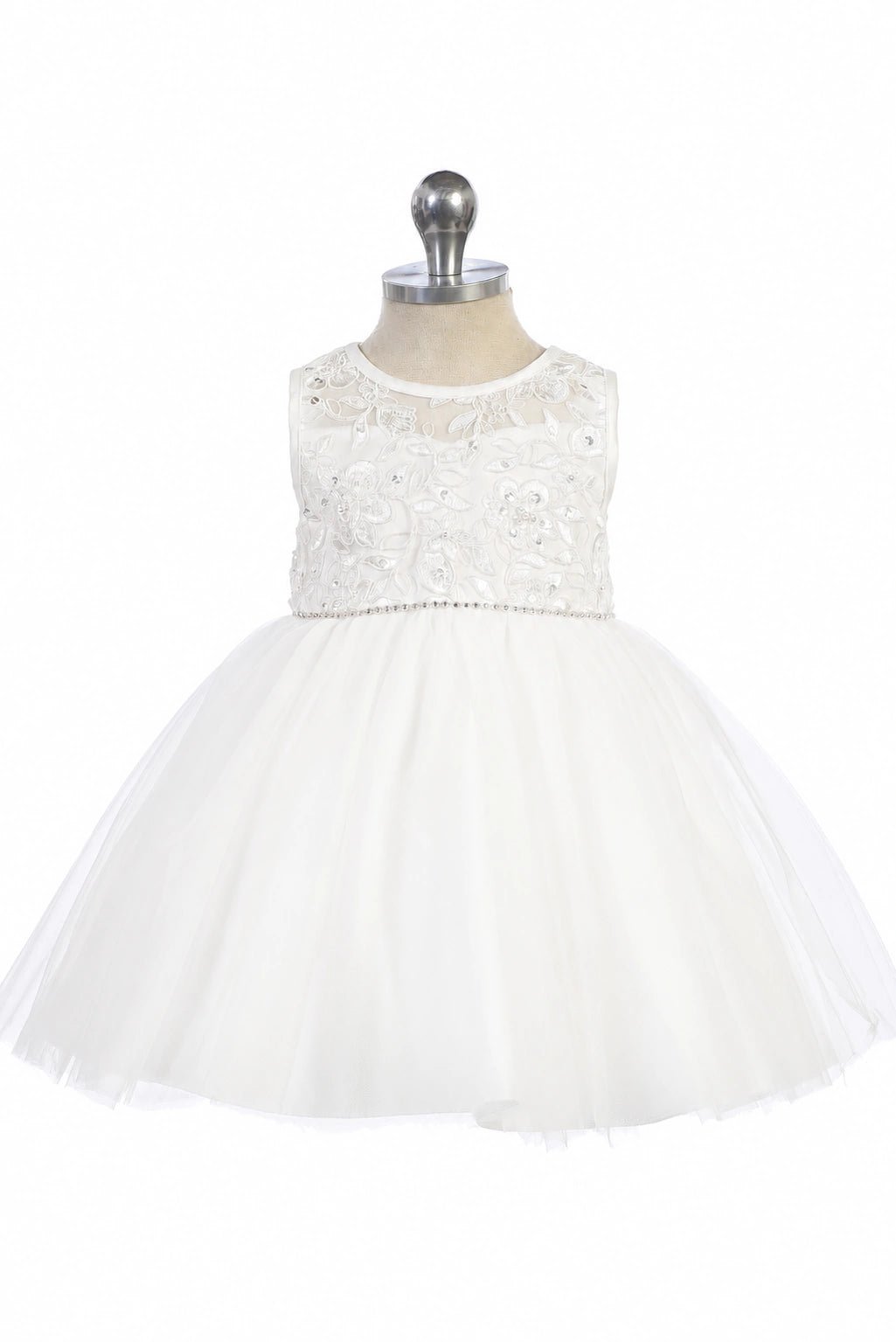 Narrow beaded waistband accents the off-white flower girl dress.