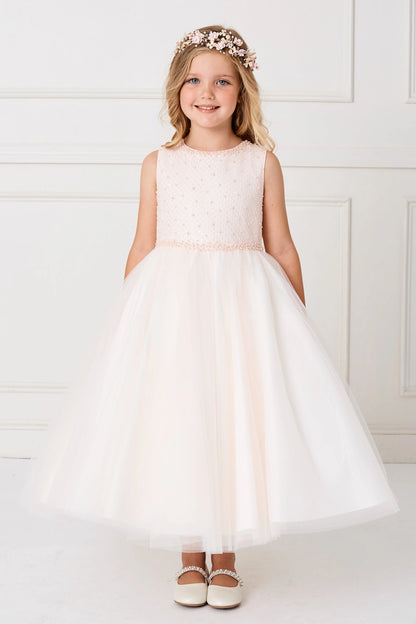 Soft gathered skirt is visible on the blush flower girl dress.