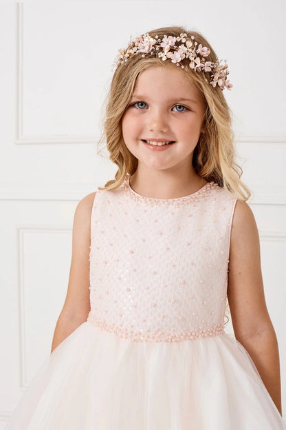 Blush flower girl dress, showing a tiny pearl bodice pattern.