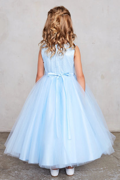 A view of a small tied back bow on the sky blue flower girl dress.